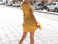 Sexy blonde Gabbie Carter flashes her juicy breasts outdoors in nice dress