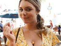 Sexy blonde Gabbie Carter flashes her juicy breasts outdoors in nice dress