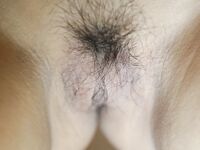 Gorgeous Asian babe Hang shows off her hairy pussy