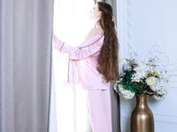 Beautiful babe Flamy Nika shows off her big ass and her trimmed pussy