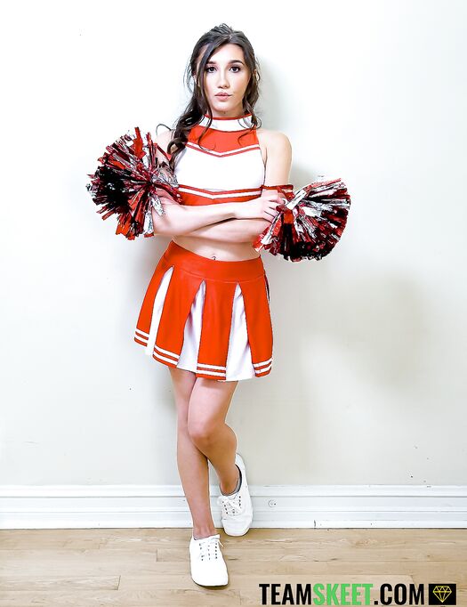 Dark-haired cheerleaders Maya Woulfe and Megan Mistakes share hard cock